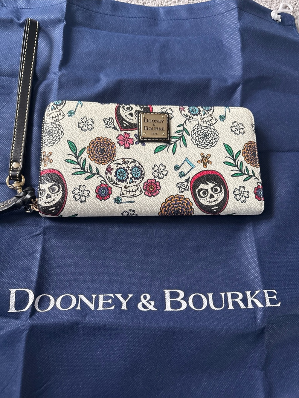 Dooney & Bourke Disney Pixar coco Wristlet with Black Strap